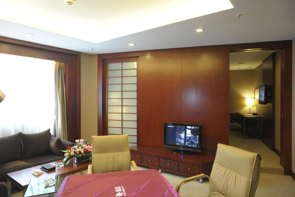 Wuhan Junyi Dynasty Hotel Oda fotoğraf